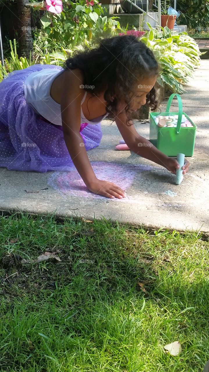 kids. drawing on the sidewalk.