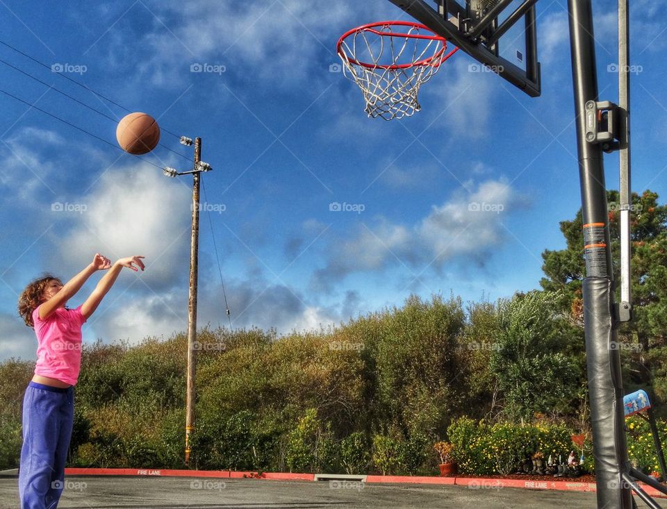 Girl Shooting Hoops