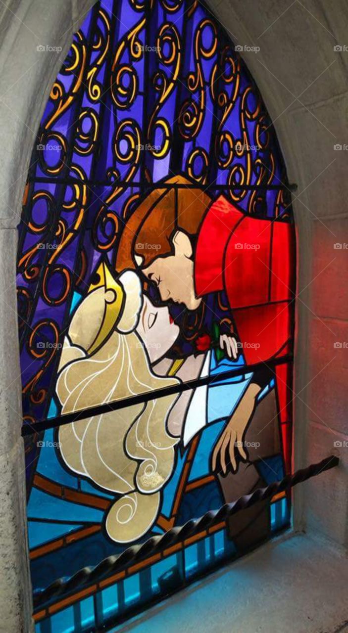 Disney land Paris / Euro Disneys
true loves kiss
one of Sleeping beauty castles
stain glass window
(series available )
Sleeping Beauty Castle is the fairy tale structure castle at the center of Disneyland Park, Hong Kong Disneyland and Disneyland Paris. It is based on the late-19th century Neuschwanstein Castle in Bavaria, Germany,with some French inspirations (especially Notre Dame de Paris and the Hospices de Beaune).