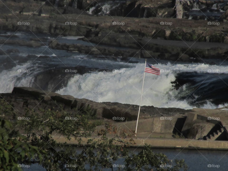 Flag by the Willamette  falls