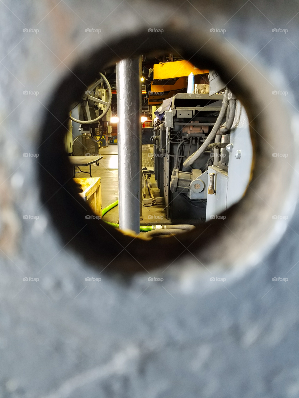 Peek through the keyhole into industry. Fires burn and wheels turn