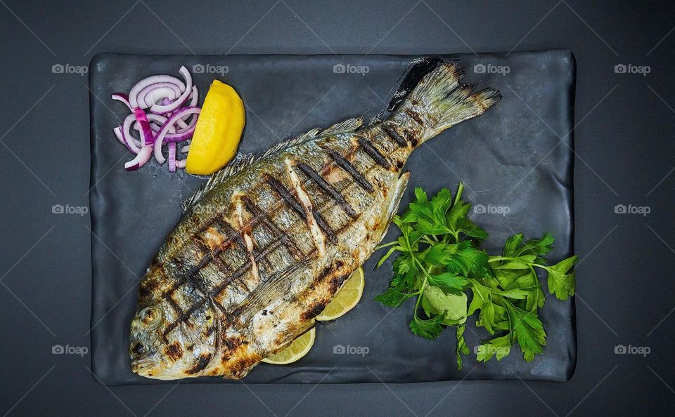 Delicious sea food grilled fish dishes