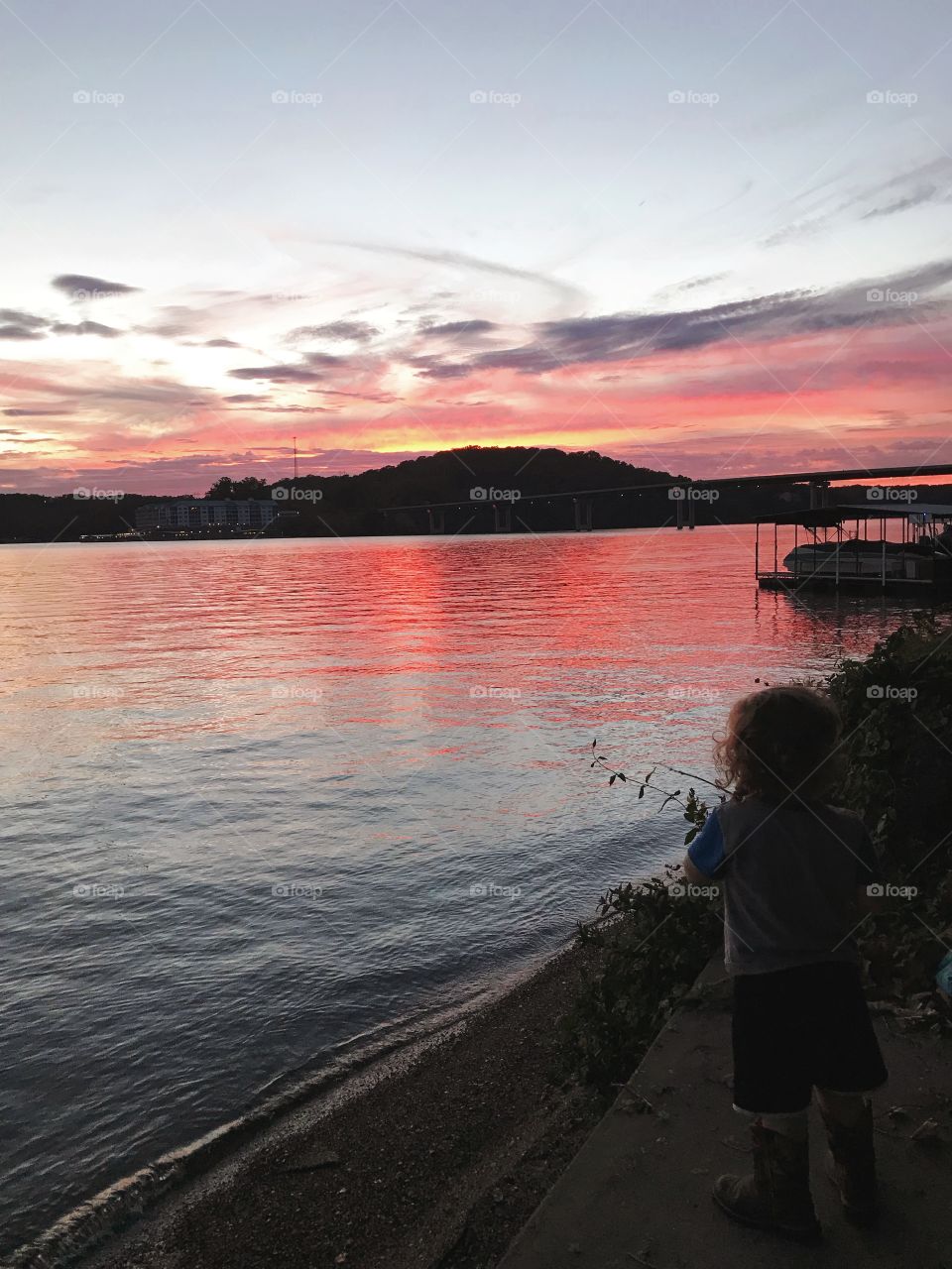 Son playing during sunset