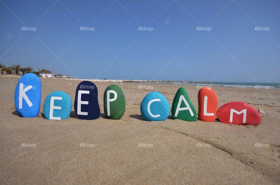 Painted stones on the sea