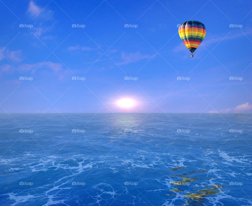 Hot Air Balloon Over Water