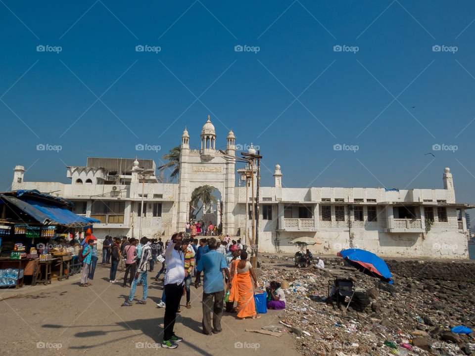 Haji Ali Dargah is a mosque and dargah (tomb) located on an islet off the coast of Worli in the southern part of Mumbai. Near the heart of the city proper, the dargah is one of the most recognisable landmarks of Mumbai.