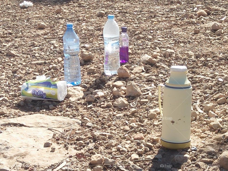 Bottles on stones