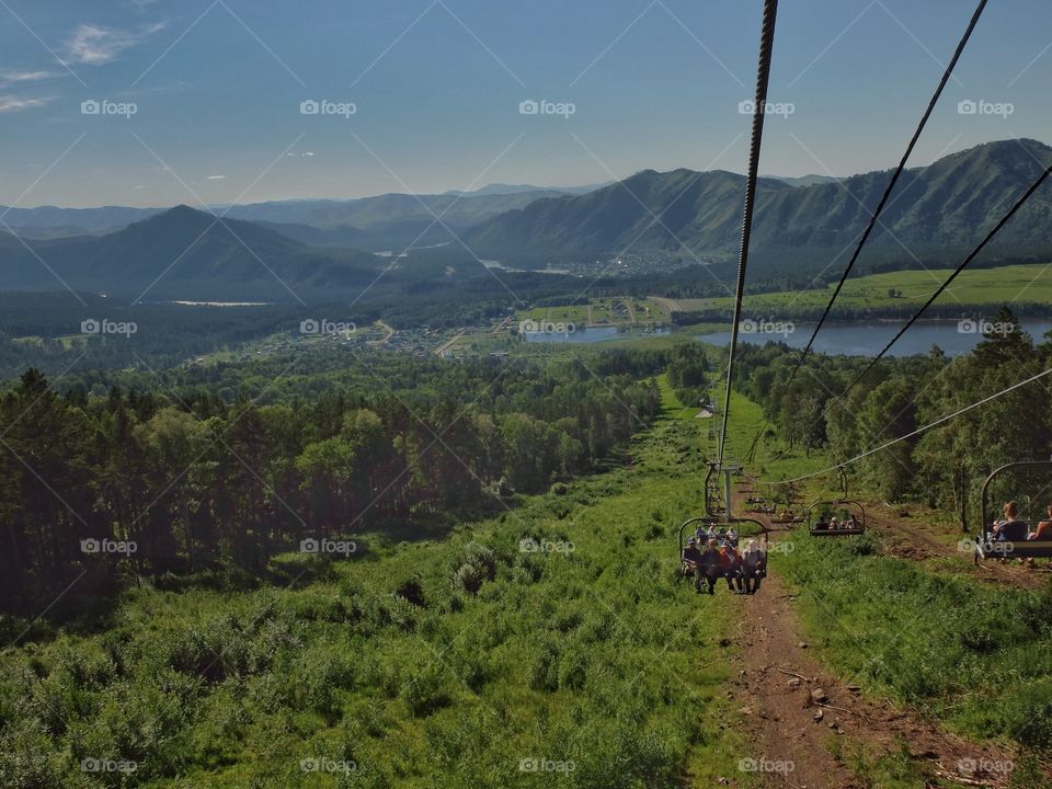 Going up. . Manzherock is the name of that place where this ski lift is situated. This is in Altai mountains, Russia. 