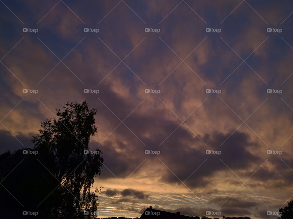 Sky with clouds during sunset in Stockholm suburb