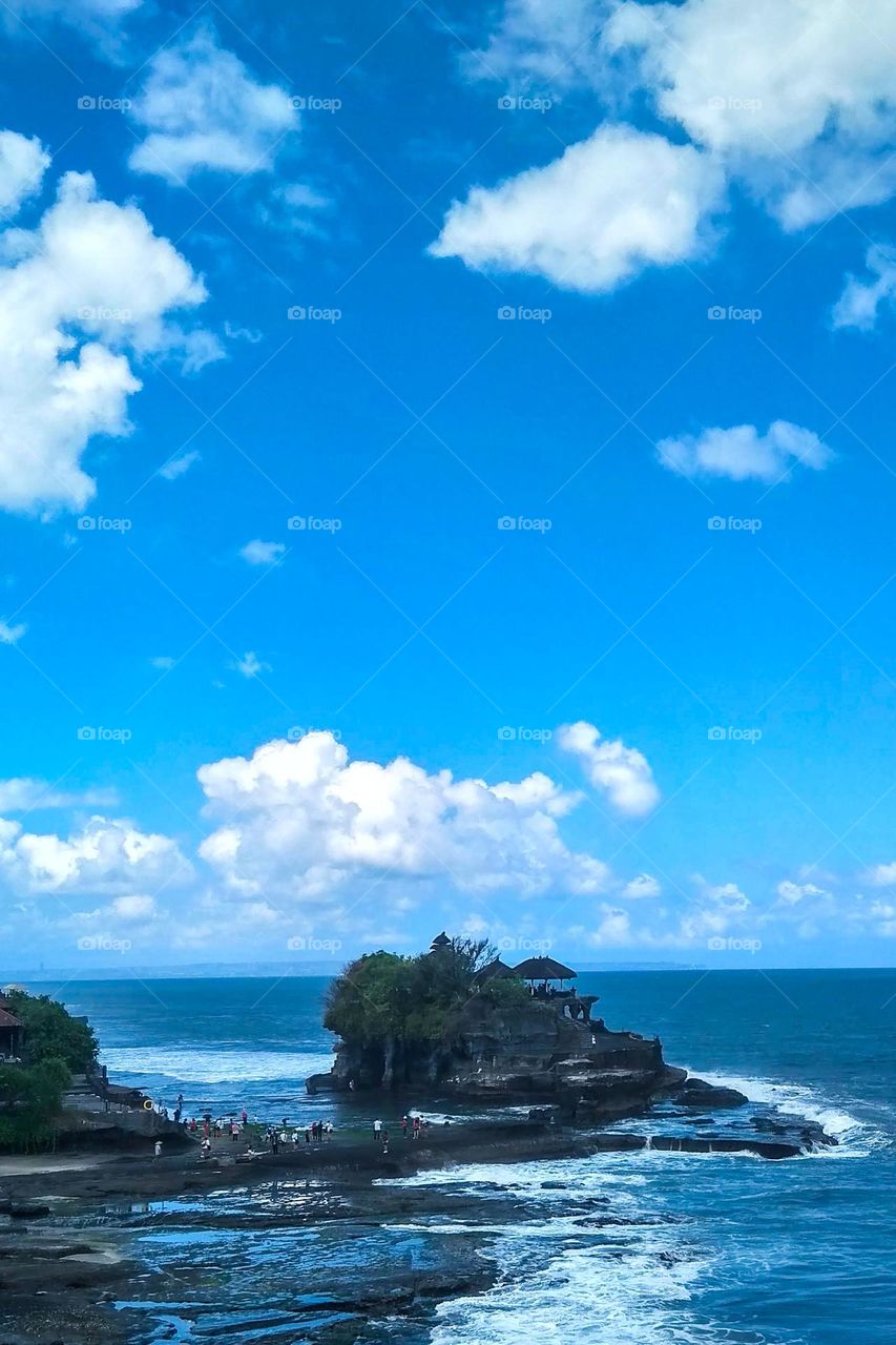 Temple in the middle of the sea in Bali, Indonesia in high angle view