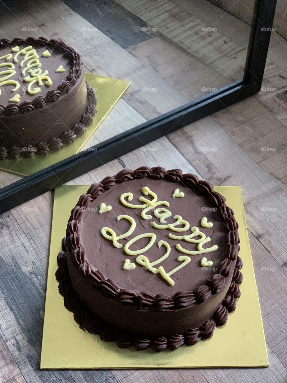 Happy 2021 chocolate cake pop with mirror reflection styling 