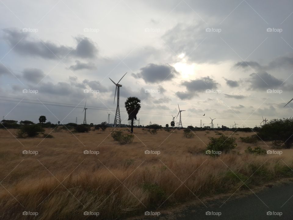 Country side motorbike trip is an best way to feel the real travell...Wind fan view at evening