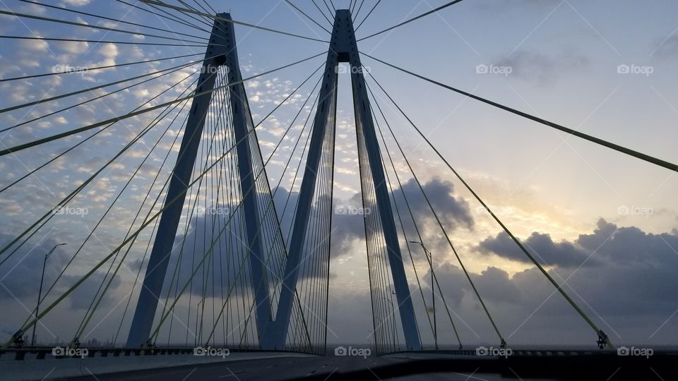 A moment caught in the middle of the Fred Hartman Bridge.