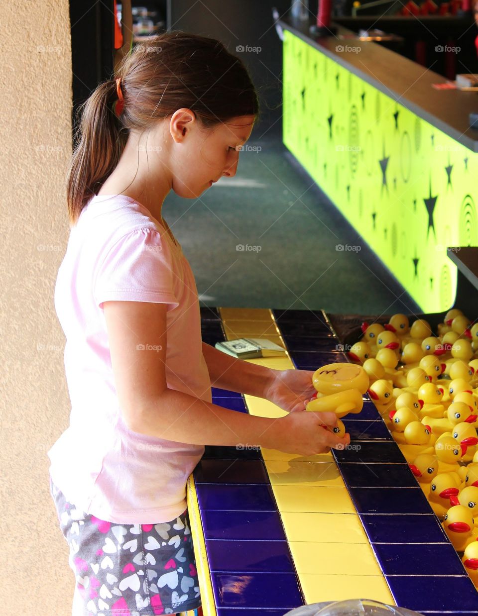 Big decision. Choosing her duckies carefully