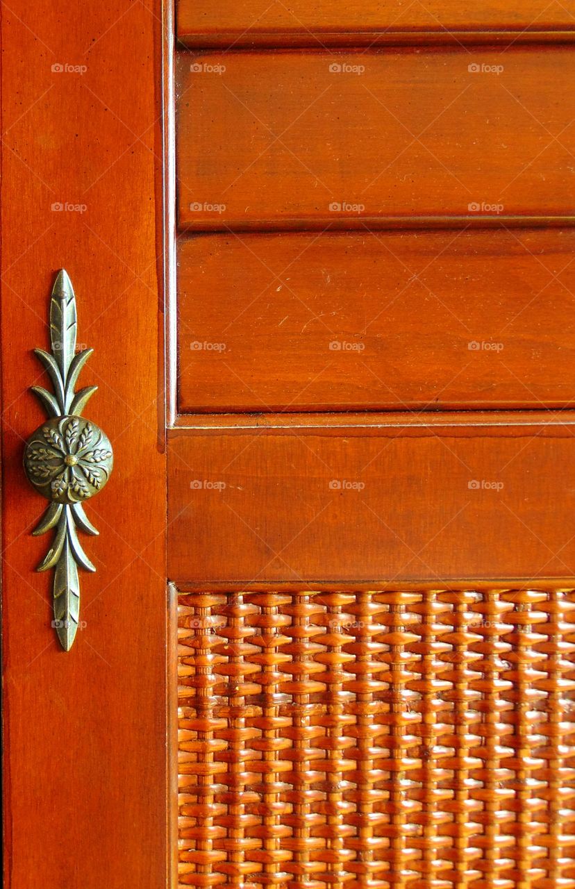 Another random photo of a door handle on a TV cabinet.