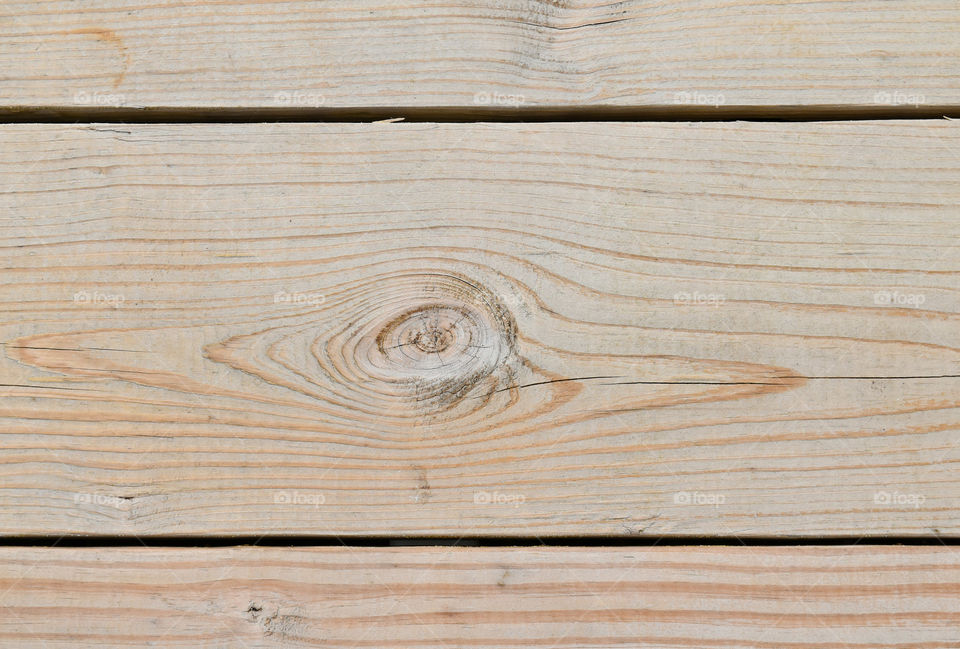 Close up of the texture of a pine plank