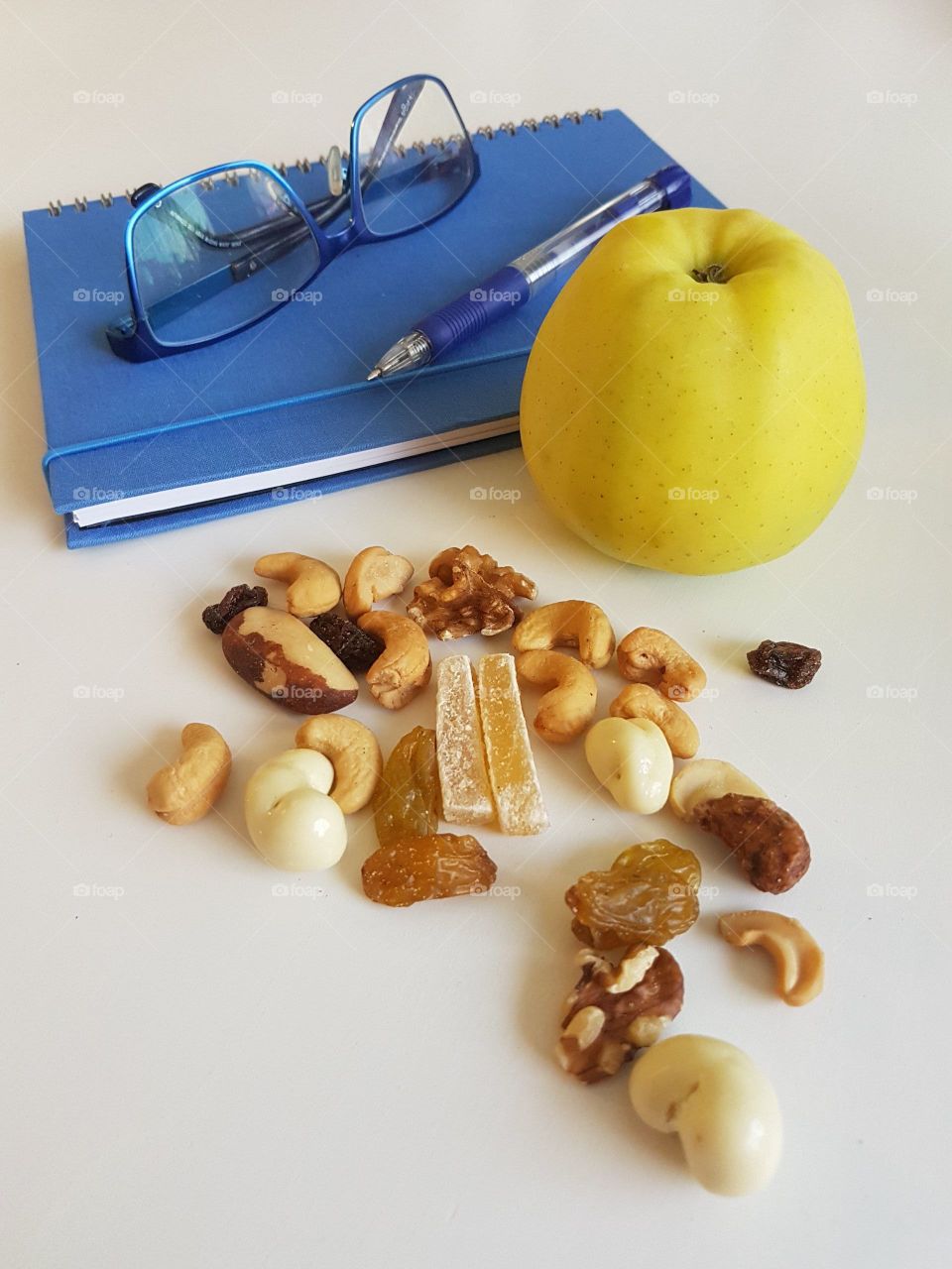 one Apple and some nuts for a daily snack