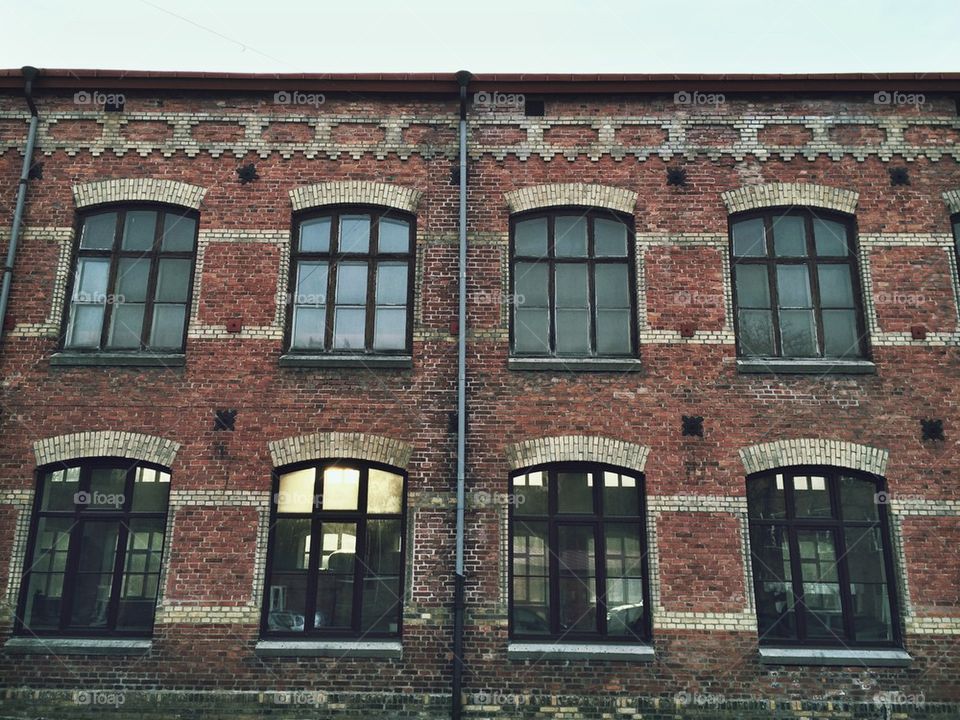 Brick wall with large windows