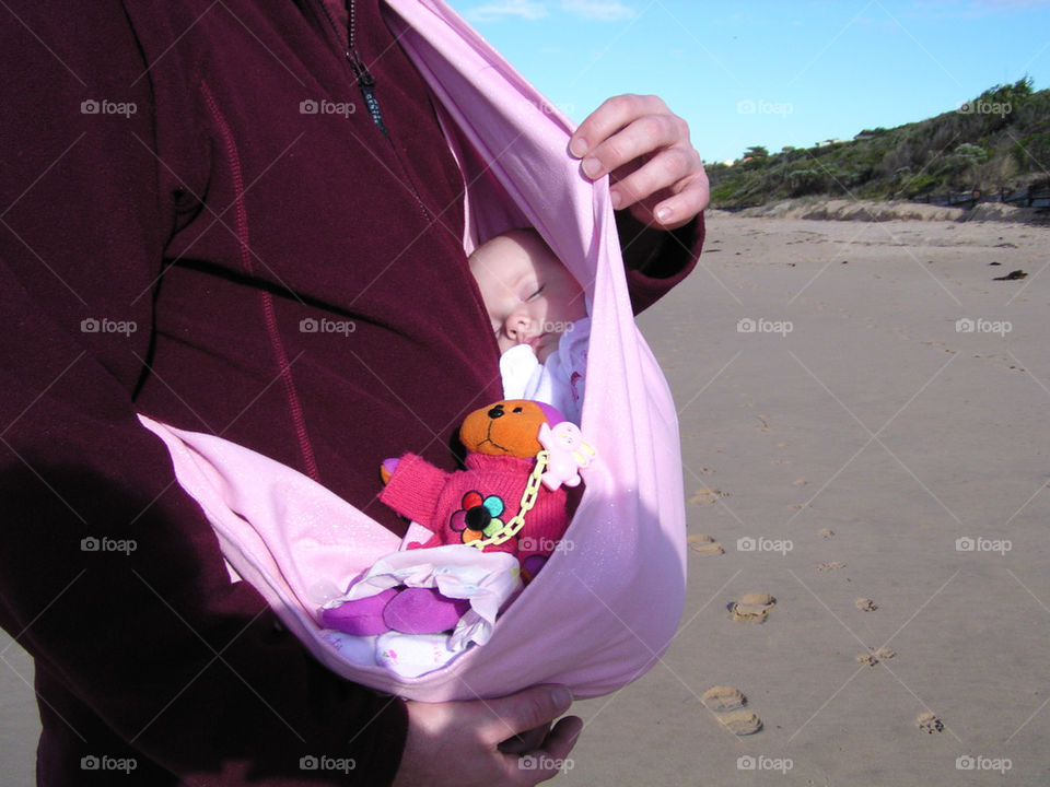 Having a walk down the beach with dad.