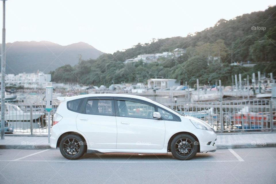 Honda Fit RS 2008 GE8 in white color with black wheels