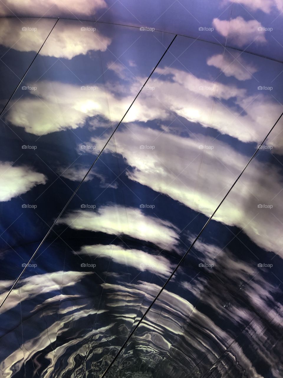Mirrored clouds in art museum. Very trippy looking.