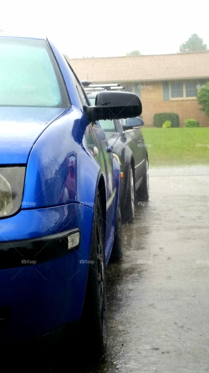 Volkswagens in the hard rain