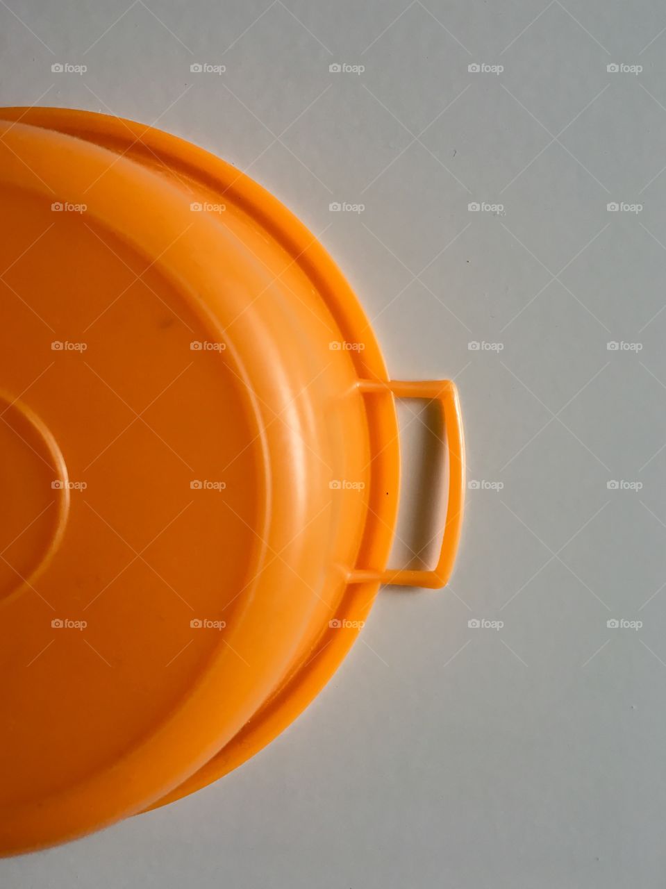 Close-up of orange container