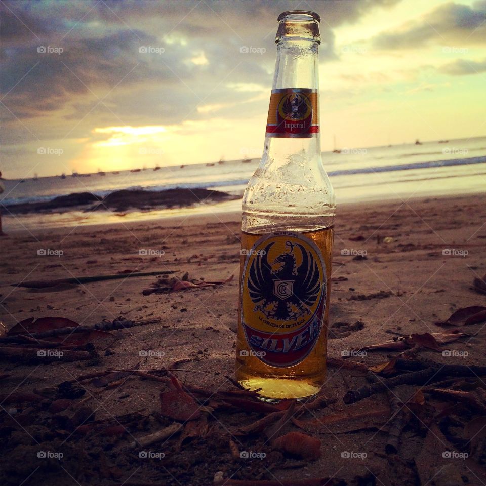 Imperial beer by beach & sunsets 