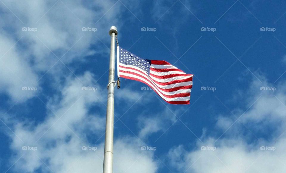 American Pride. Stars and Stripes in shopping center parking lot