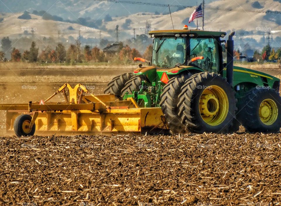 Tractor Plowing A Field