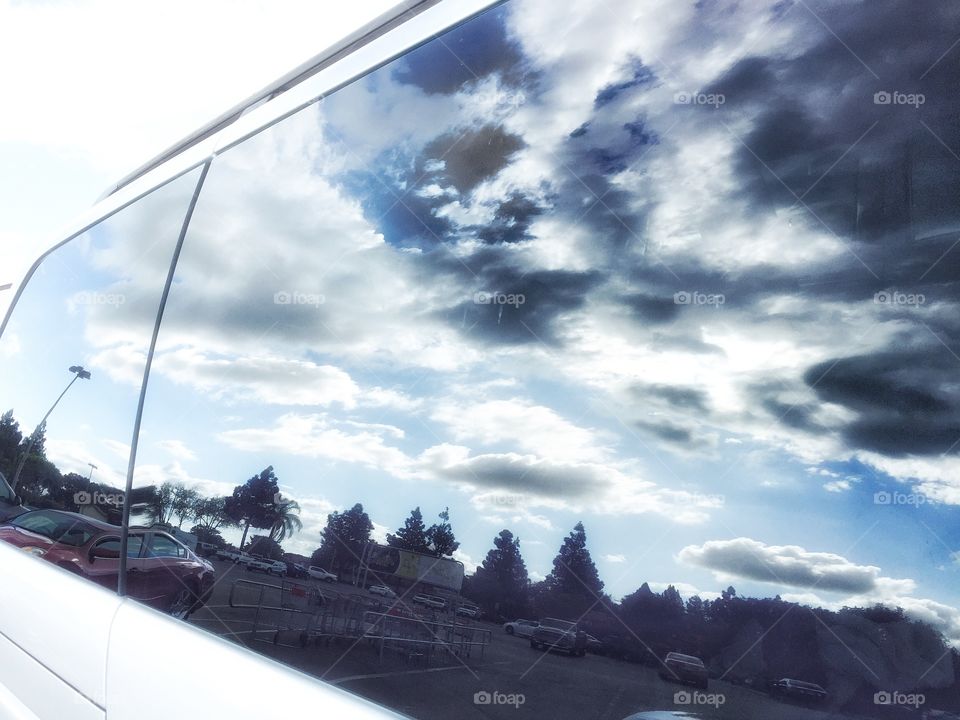 Sky, Clouds Seen In Car Window