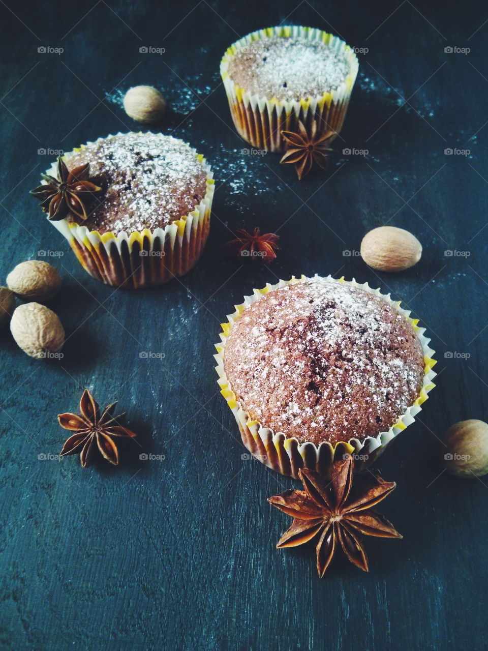 Muffins. Several chocolate muffins on dark background