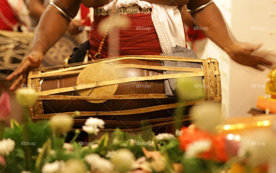 playing traditional drum