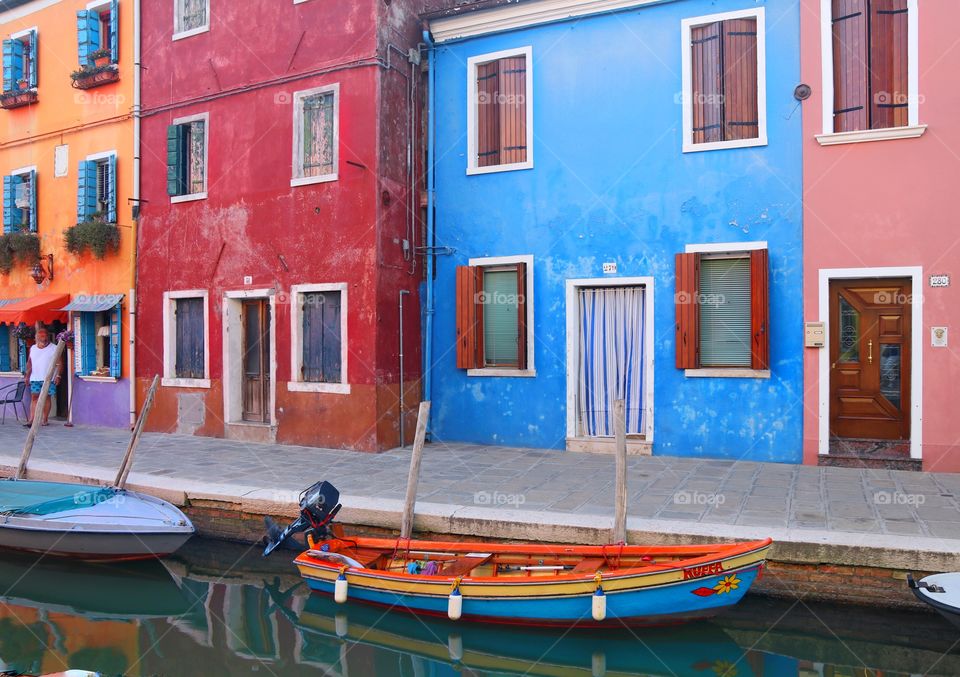 Colorful houses and a boat