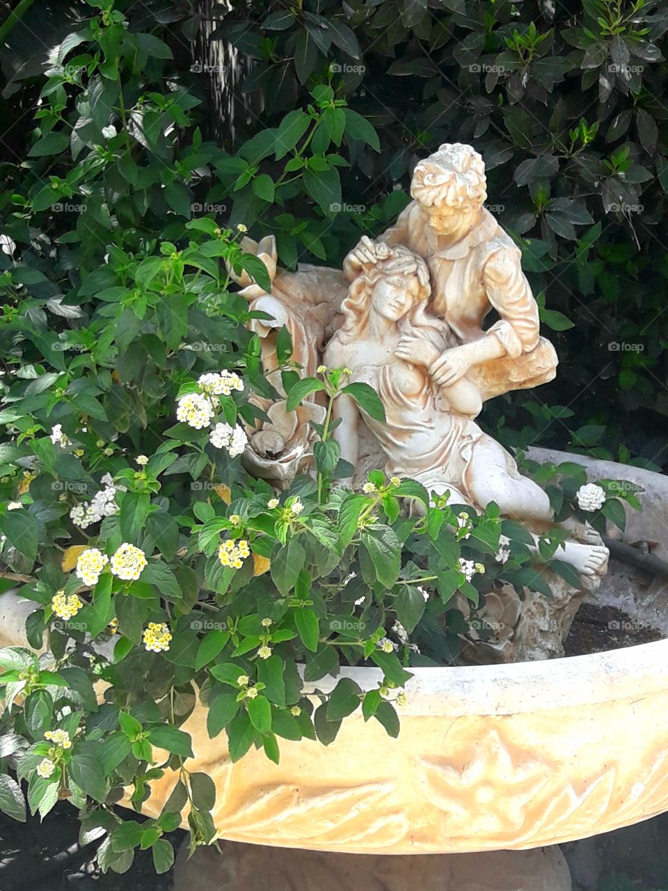 beautiful statue with flower