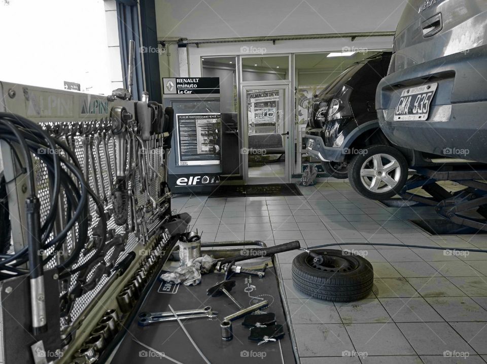 At the car repair shop: tools and cars