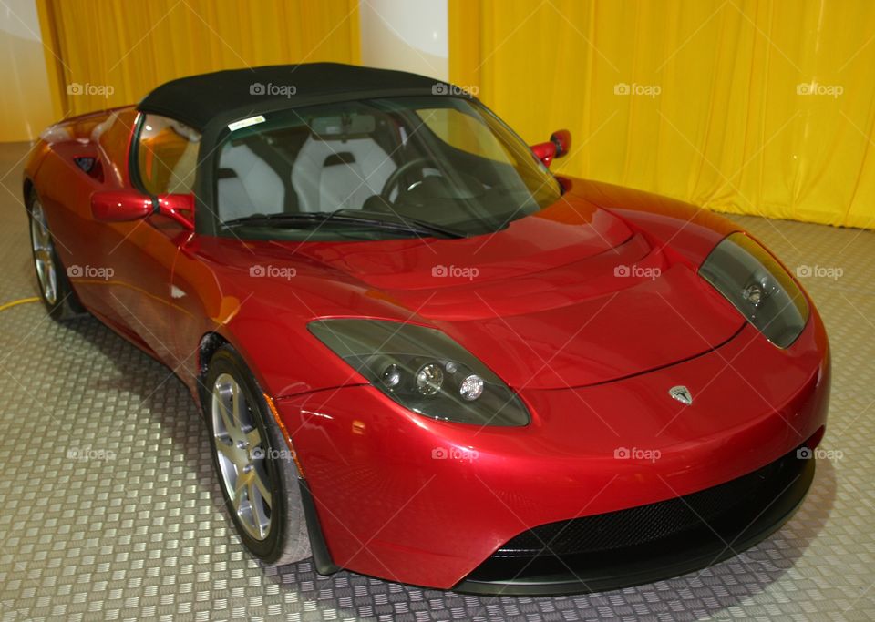 Tesla Roadster. Red Tesla Roadster