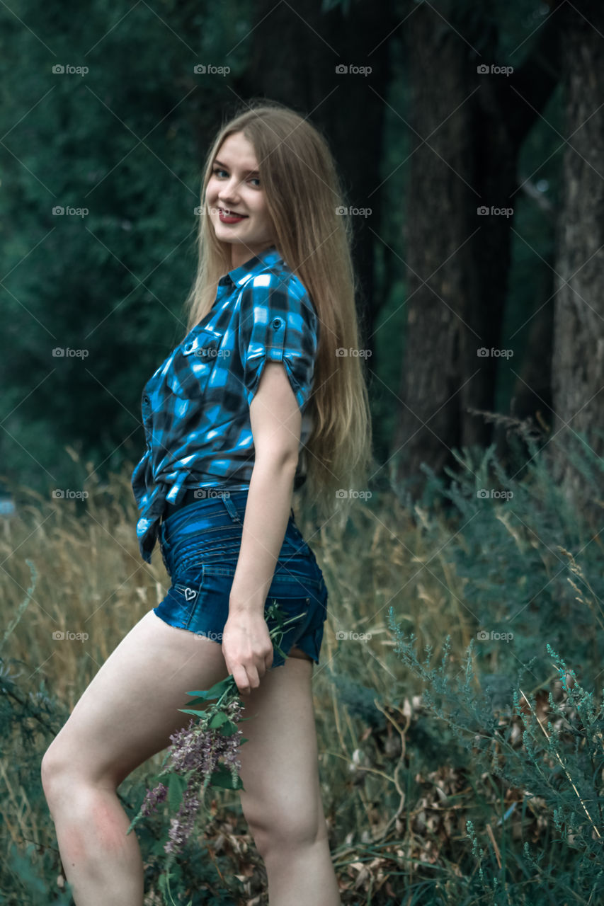 A girl with blond hair in a plaid shirt and short denim shorts on a background of trees and nature
Girl, woman, people, blonde, blonde hair, checkered shirt, shorts shorts, denim shorts, forest, nature, trees, grass, feelings, emotions, tenderness, love, lifestyle, lifestyle, recreation