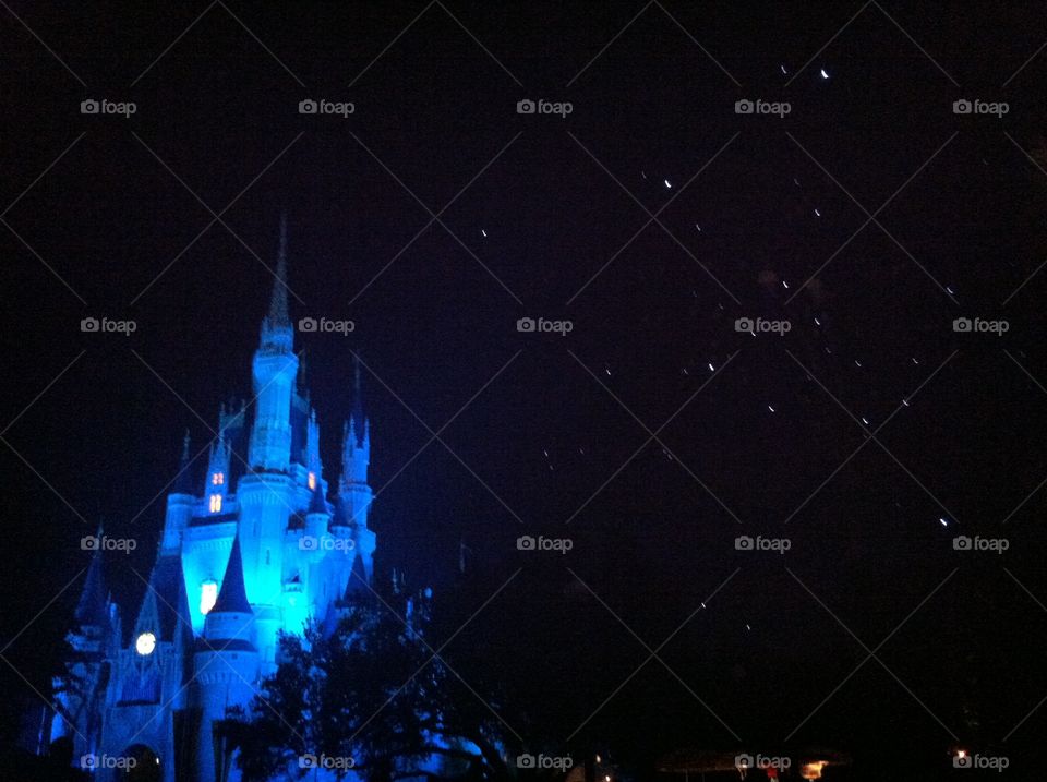 Cinderella Castle at night. Disney castle during fireworks

