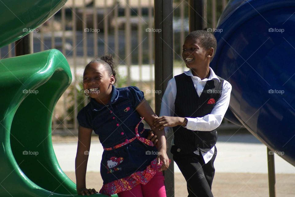 kids having fun at the park playgound