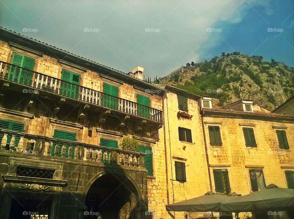 historic old building with green windows