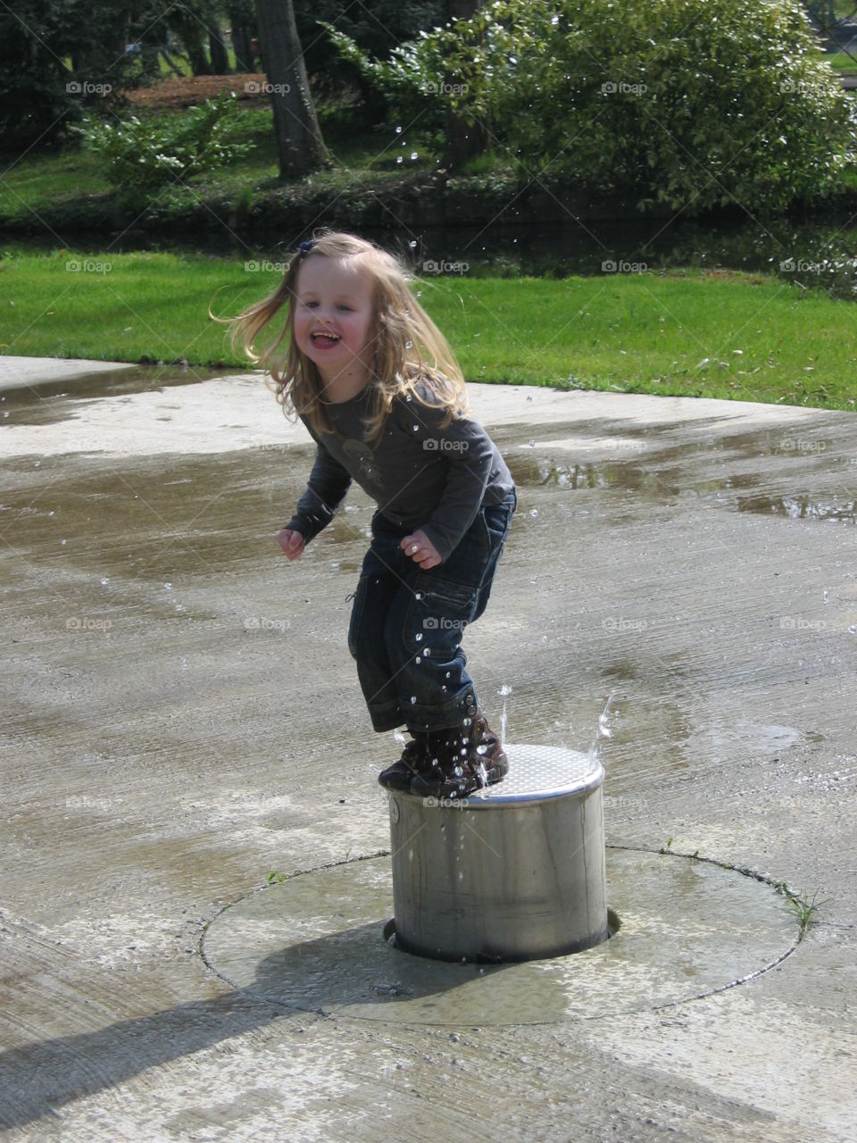 Girl jumping in a water Parc 