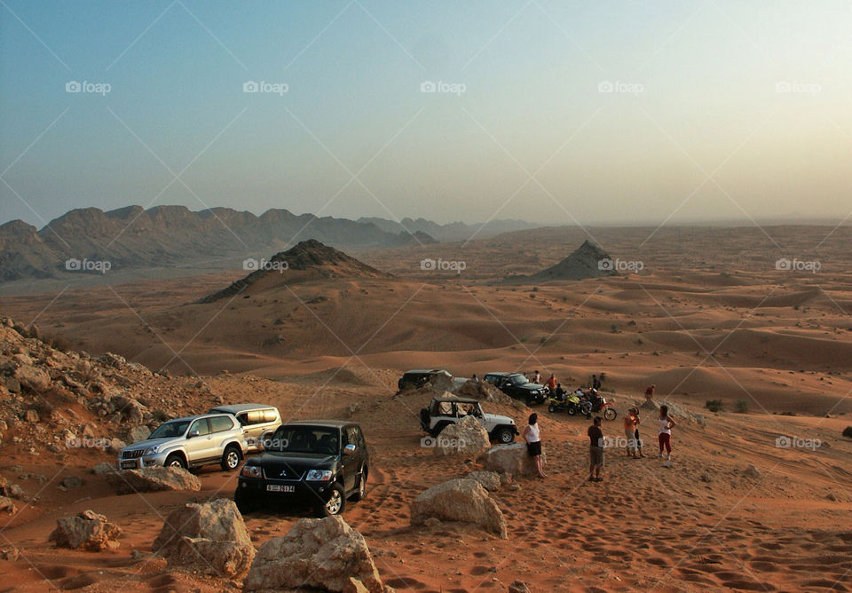 people sunset sand mountains by chrisc