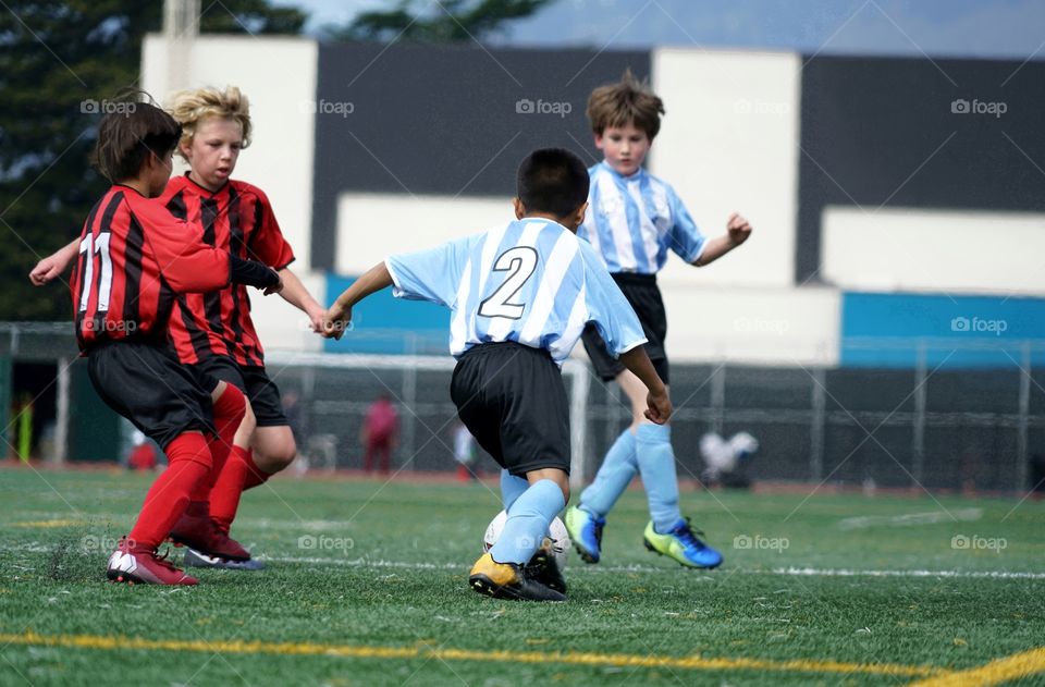 Young Boys Playing Soccer