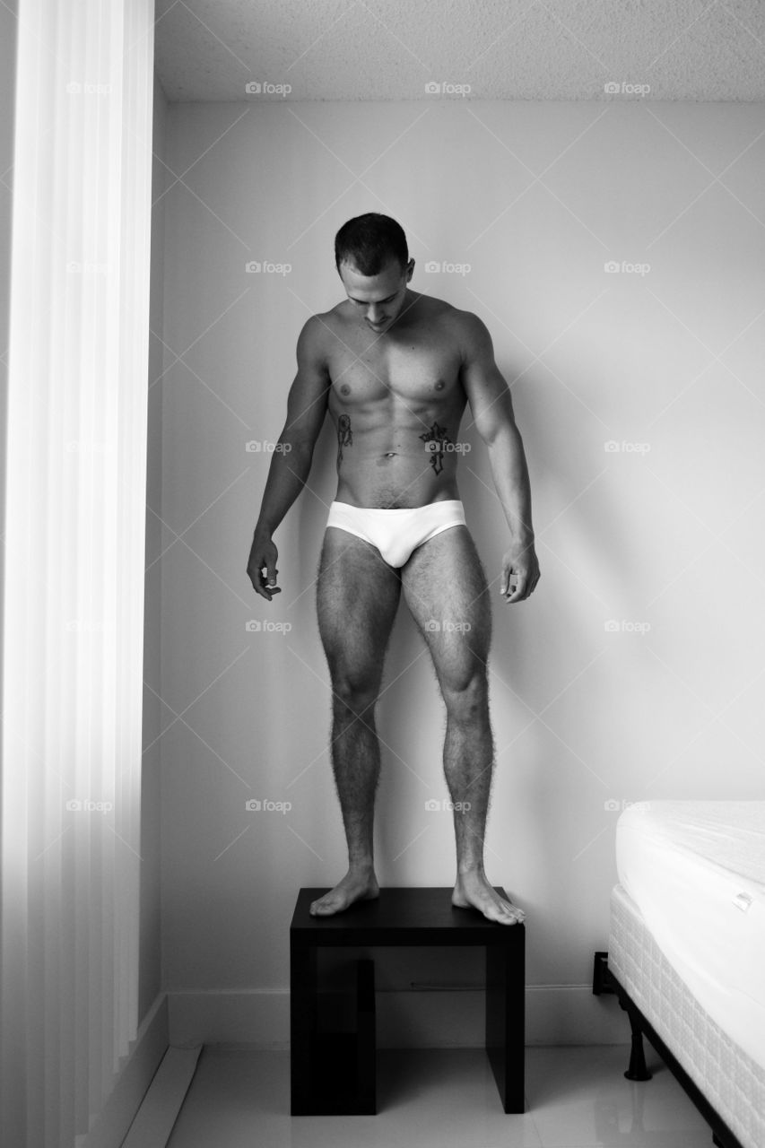 Man standing on table