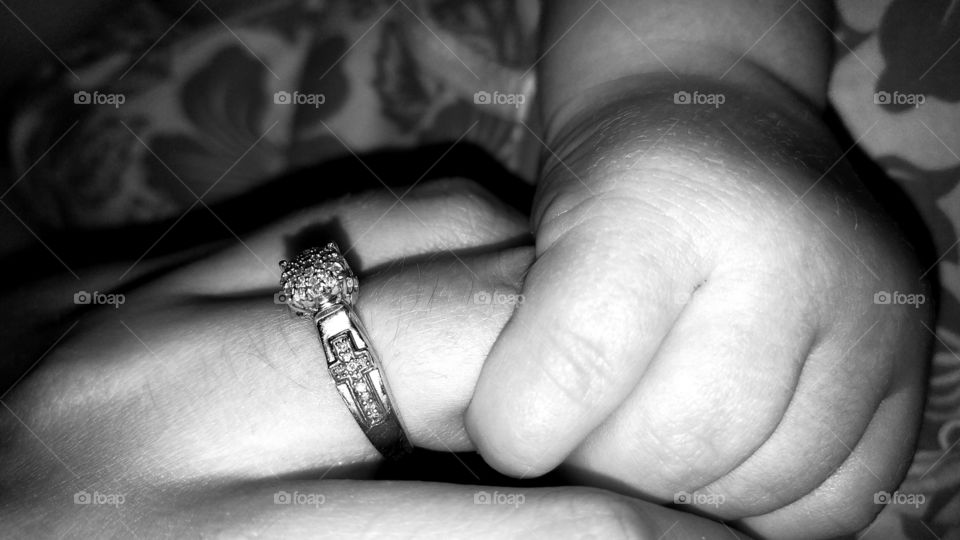 baby and mom's hands