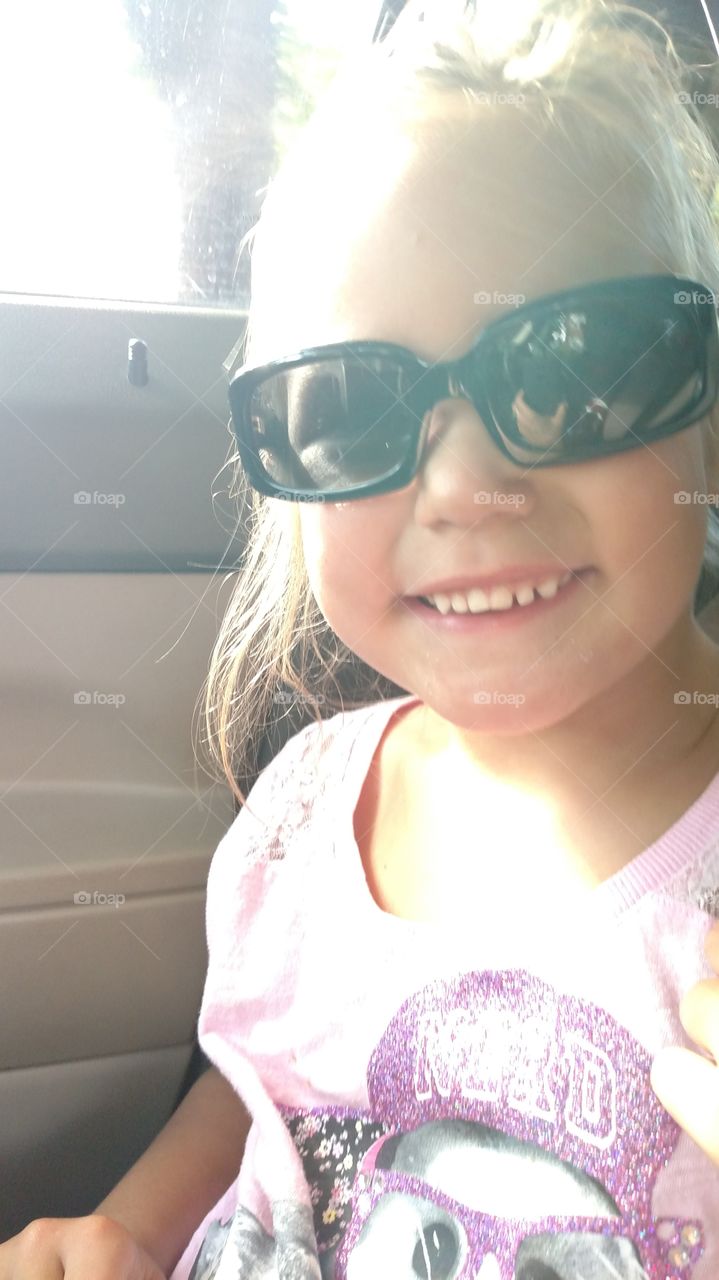 Wearing big girl sunglasses