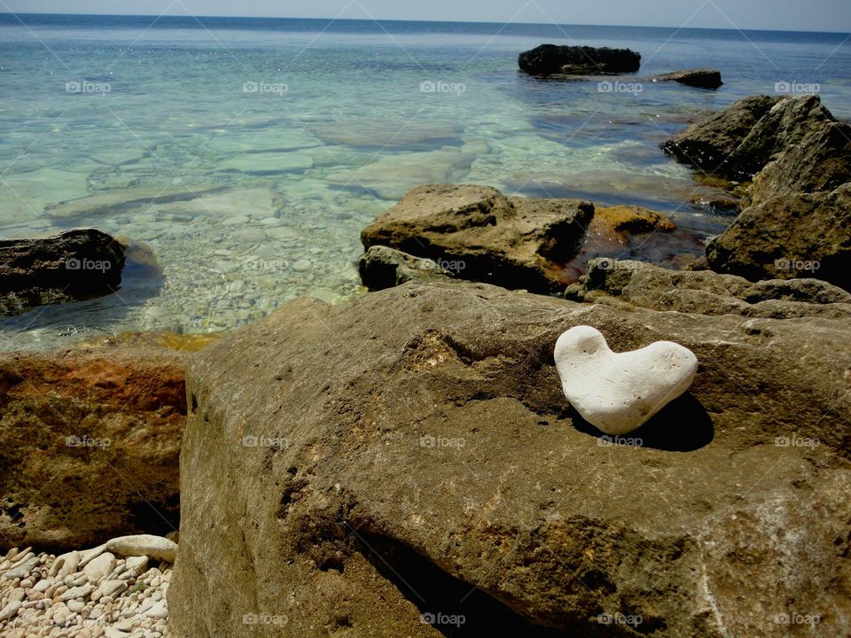 sea stones and clear water