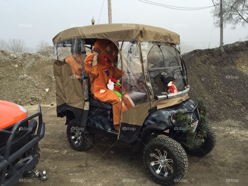 Gingerbread Man in the golf cart