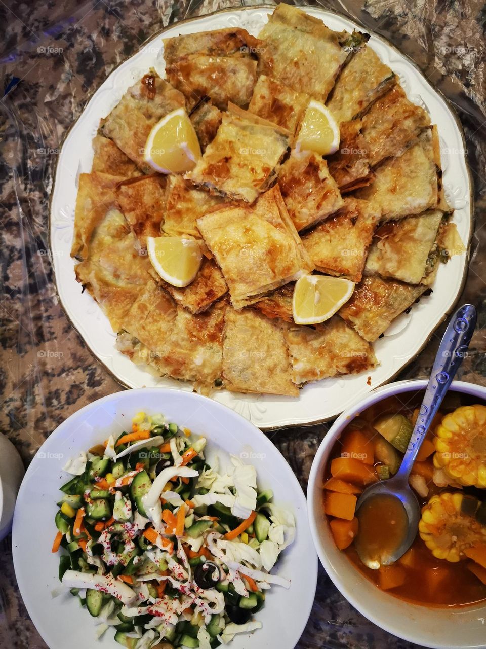 Lunch with vegetable stock in sauce with wheat chips stuffing with meat and cheese
